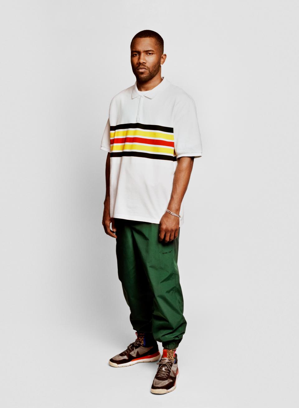 <cite class="credit">Polo shirt, and custom vintage pants, by Gore-Tex / Sneakers, by Tom Sachs x NikeCraft Mars Yard 2.0</cite>