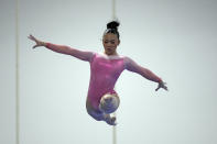 Sunisa Lee competes on the blance beam at the American Classic Saturday, April 27, 2024, in Katy, Texas. (AP Photo/David J. Phillip)