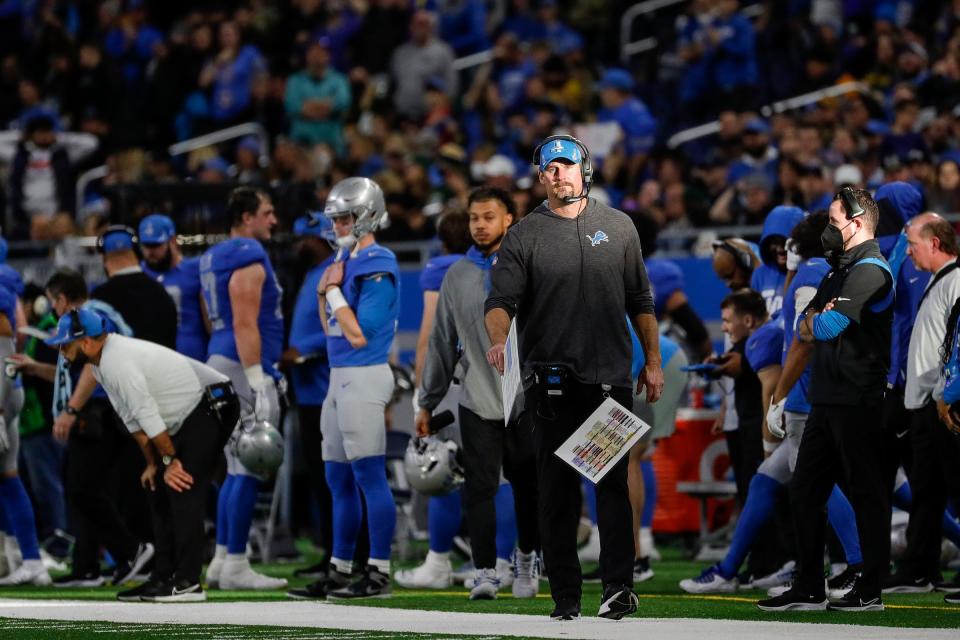 Lions coach Dan Campbell walks along the sideline before a play during the second half of the Lions' 37-30 win over the Packers on Sunday, Jan. 9, 2022, at Ford Field.