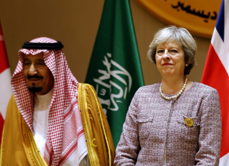 British Prime Minister Theresa May, here shown with Saudi King Salman at a Gulf Cooperation Council (GCC) summit on December 7, 2016 in Bahrain, heads to Saudi Arabia on Tuesday