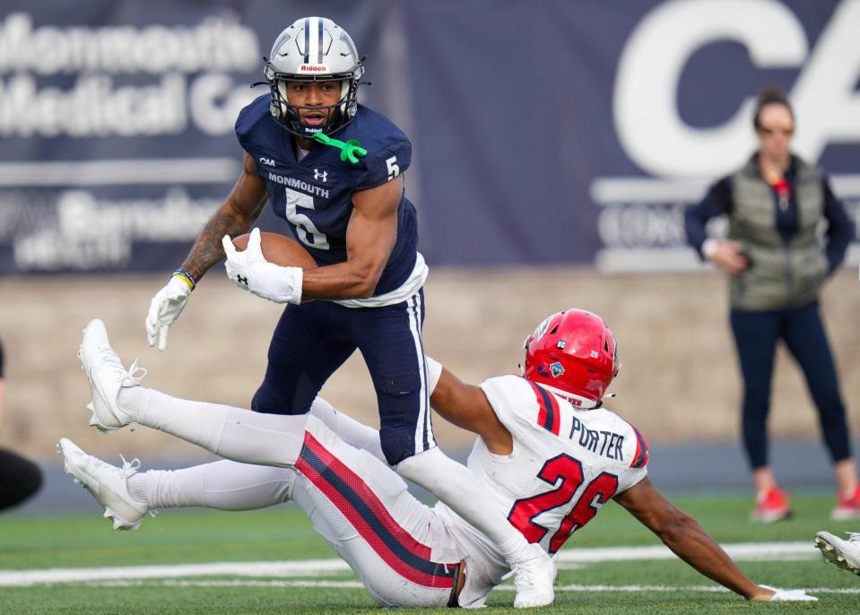 Monmouth receiver Dymere Miller breaks a tackle against Stony Brook during the Hawks' 56-17 victory on Nov. 4, 2023 in West Long Branch, N.J.