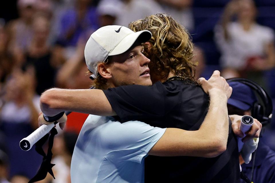 PHOTO: Jannik Sinner, of Italy, hugs Alexander Zverev, of Germany, after Zverev won their match during the fourth round of the U.S. Open tennis championships in New York, New York, on Sept. 5, 2023. (Adam Hunger/AP)