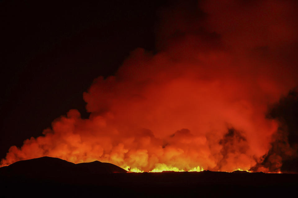 A view of the volcano erupting, north of Grindavík, Iceland, Thursday, Feb. 8, 2024. Iceland’s Meteorological Office says a volcano is erupting in the southwestern part of the country, north of a nearby settlement. The eruption of the Sylingarfell volcano began at 6 a.m. local time on Thursday, soon after an intense burst of seismic activity. (AP Photo/Marco Di Marco)