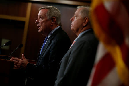 U.S. Senator Richard Durbin (D-IL) (L) and Senator Lindsey Graham (R-SC) (R) speak about proposed legislation to deal with so-called "Dreamers," children of undocumented immigrant families who were covered under the Deferred Action for Childhood Arrivals (DACA) program, during a news conference at the U.S. Capitol in Washington, U.S. September 5, 2017. REUTERS/Jonathan Ernst