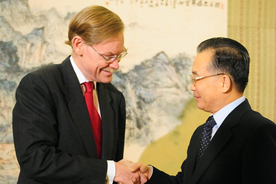 羅伯特·佐利克（Robert Zoellick）和溫家寶。