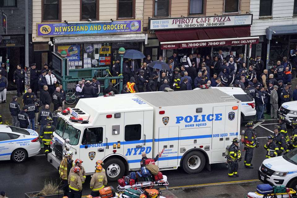 FILE - Emergency personnel gather at the entrance to a subway station in the Brooklyn borough of New York, after a gunman filled a rush-hour subway train with smoke and shot multiple people, April 12, 2022. James, who sprayed a New York City subway car with bullets during rush hour, wounding 10 people and sparking a citywide manhunt, was sentenced Thursday, Oct. 5, 2023, to life in prison after defense attorneys underscored his serious mental illness and said he didn't ever intend to kill anyone. (AP Photo/John Minchillo, File)