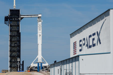 A SpaceX Falcon 9 carrying the Crew Dragon spacecraft sits on launch pad 39A prior to the uncrewed test flight to the International Space Station from the Kennedy Space Center in Cape Canaveral, Florida, U.S., March 1, 2019. REUTERS/Mike Blake