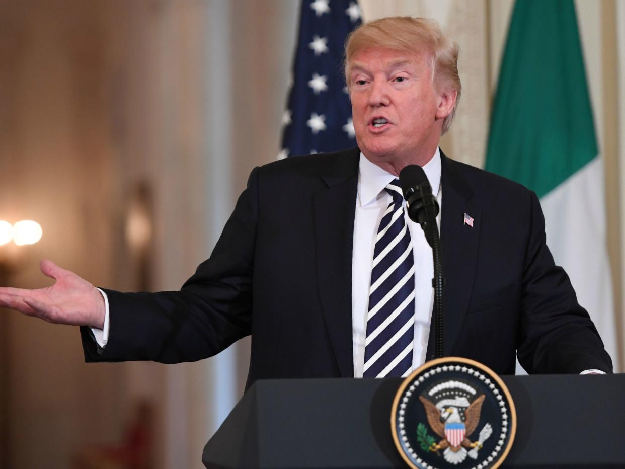US President Donald Trump doubles down on his threat to shut down the government over funding for his border wall with Mexico during a joint press conference with Italian Prime Minister Giuseppe Conte: SAUL LOEB/AFP/Getty Images