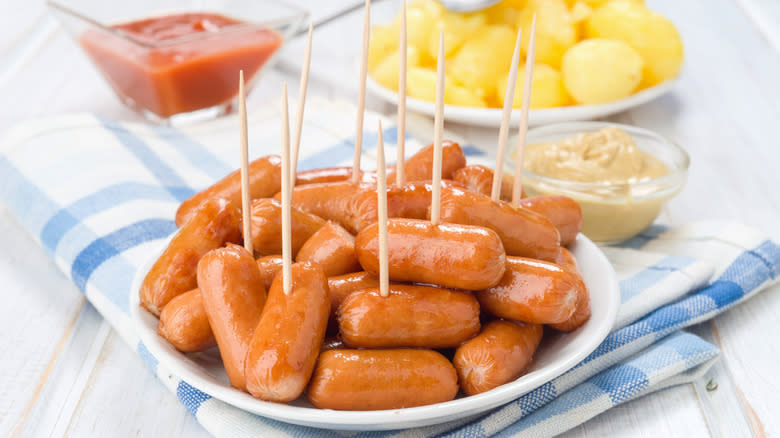 Glazed Vienna sausages on a plate