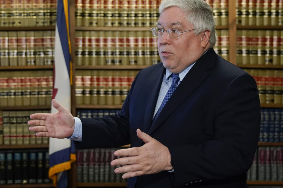 West Virginia Attorney General Patrick Morrisey speaks with reporters to announce a $68 million settlement with the Kroger pharmacy chain over its role in perpetuating the opioid crisis during a news conference at the state Capitol in Charleston on Thursday, May 4, 2023 in Charleston, W.Va. (AP Photo/Jeff Dean)