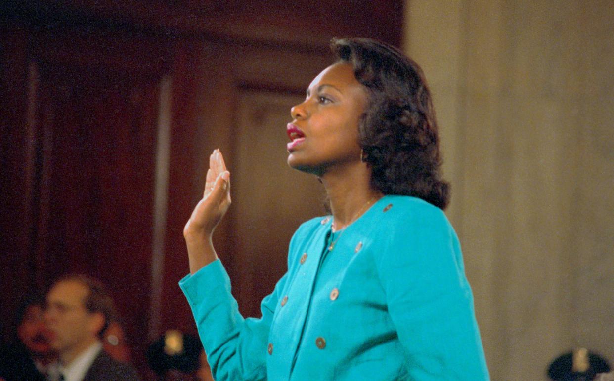 Anita Hill being sworn in before testifying at the Senate Judiciary hearing on Thomas' Supreme Court nomination. (Photo: Bettmann via Getty Images)