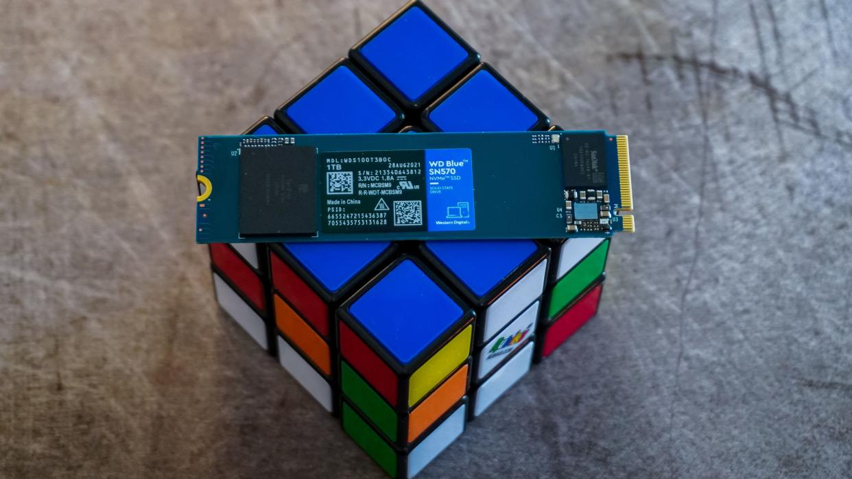  A WD Blue SN570 resting on top of a Rubik's cube. 