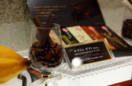 Shiho Sudo poses with her KitKat Chocolatory Sublime with original messages after buying it at the KitKat Chocolatory Ginza main store in Tokyo, Japan, November 27, 2017. REUTERS/Toru Hanai