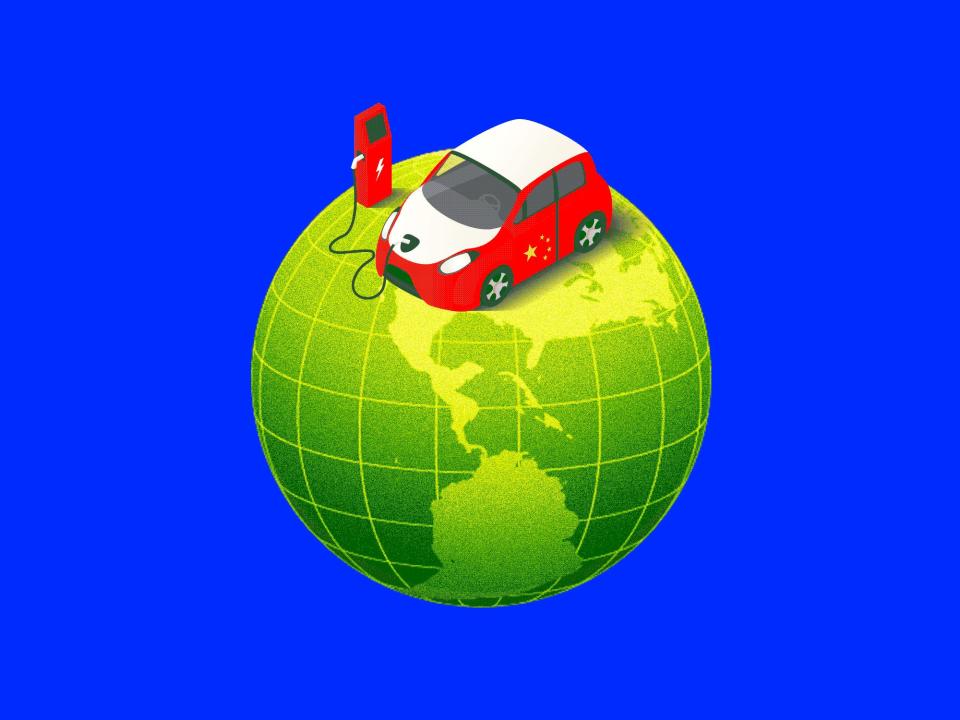 A red electric car on a spinning globe