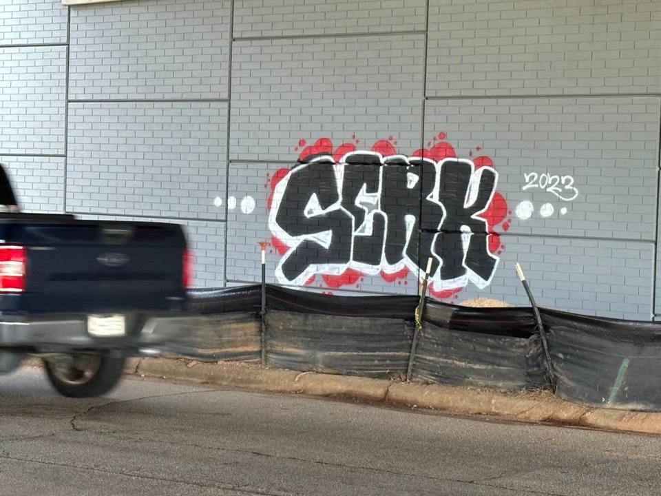 Some of the graffiti along the Beltline in West Raleigh is more elaborate than others. This piece appeared on the new bridge support walls along Beryl Avenue.