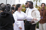 Jury members Lily Gladstone, left, and Omar Sy pose for photographers during the jury photo call at the 77th international film festival, Cannes, southern France, Tuesday, May 14, 2024. (Photo by Scott Garfitt/Invision/AP)