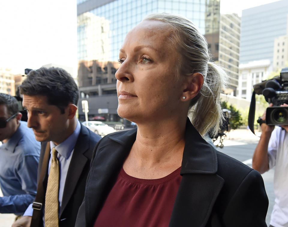 FILE - In this Aug. 23, 2018 file photo, Margaret Hunter, the wife of U.S. Rep. Duncan Hunter, R-Calif.,arrives for an arraignment hearing in San Diego. Federal prosecutors say Duncan Hunter illegally used campaign funds to finance romantic flings with a series of women, spending thousands of dollars on meals, drinks and vacations. Allegations about the married Republican congressman's affairs were outlined in a government court filing late Monday, June 24, 2019, connected to charges he and his wife misspent more than $200,000 on trips and personal expenses. (AP Photo/Denis Poroy, File)