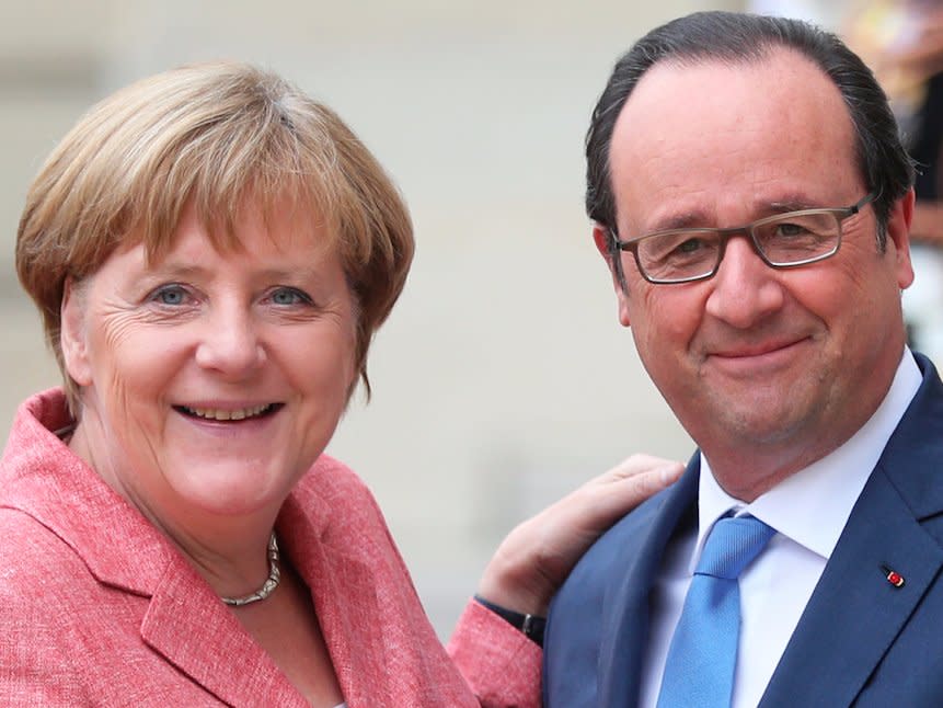 France's President Francois Hollande, right, poses with German Chancellor Angela Merkel, prior to the Balkans summit, at the Elysee Palace, in Paris, Monday, July 4, 2016. The leaders of France, Germany, Italy and Balkan nations are meeting to better prevent extremists from sneaking in with migrants who are moving west across Europe. ()