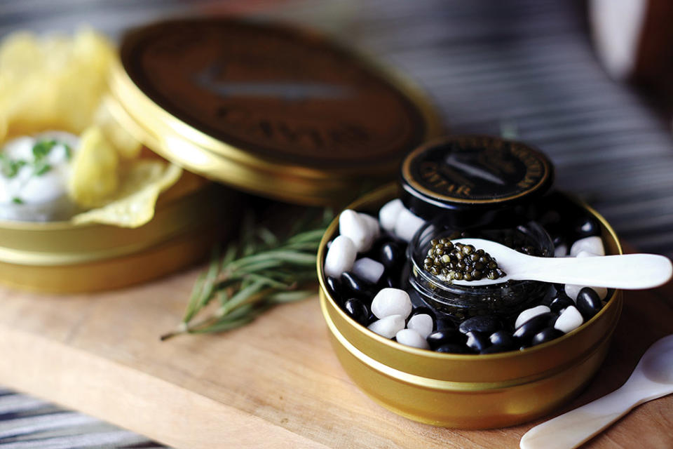 Tsar Nicoulai Osetra Caviar is served with Spanish chips and crème fraîche.