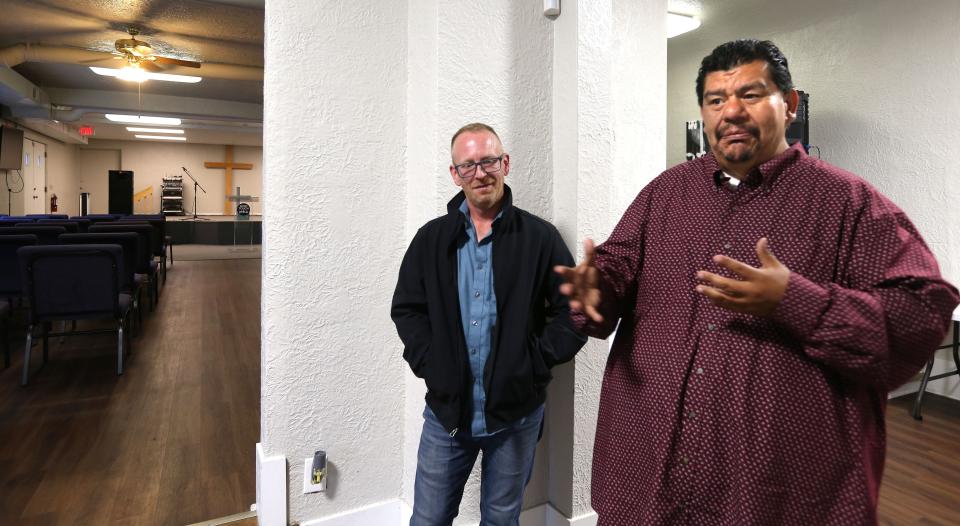 Pastor Marty Calderon, right, of God Touch Milwaukee ministry, talks about their efforts of reaching out to area communities on the south side. Joining him is Nicholas Hackbarth, the church's assistant executive director.