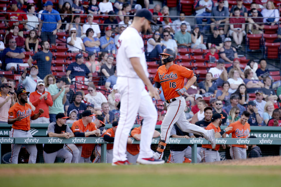 Baltimore Orioles' Trey Mancini (16) rounds the bases past Boston Red Sox relief pitcher Josh Smith (67) after hitting a home run during the ninth inning of a baseball game, Saturday, Sept. 28, 2019, in Boston. (AP Photo/Mary Schwalm)