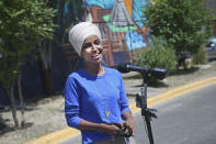 Democrat Rep. Ilhan Omar addresses media after lunch at the Mercado Central in Minneapolis Tuesday, Aug. 11, 2020, primary Election Day in Minnesota. (AP Photo/Jim Mone)