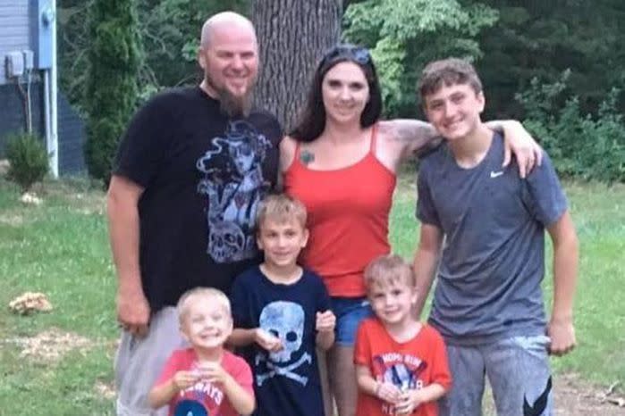 Tina Brazil and her boyfriend Mike Andrews pictured with her four children who were killed in the blaze. Source: Tina Brazil/Facebook