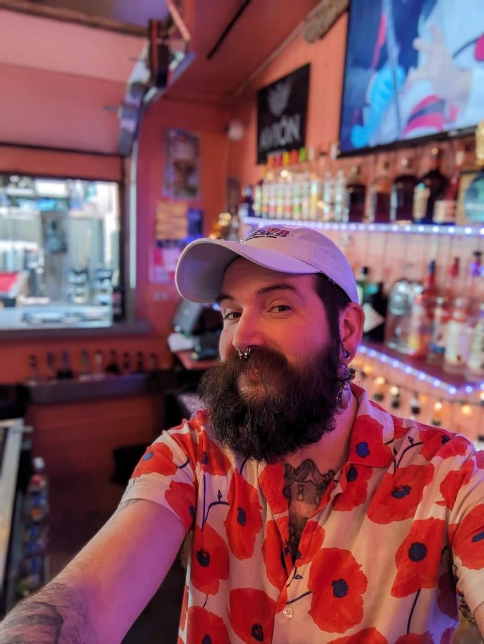 Matt Knaggs behind the bar at Brodie's Dark Horse Tavern in Tucson, Arizona.