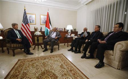 U.S. Secretary of State John Kerry (L) meets with Palestinian Authority President Mahmoud Abbas (2nd L) and members of his delegation in Amman, November 7, 2013. REUTERS/Jason Reed