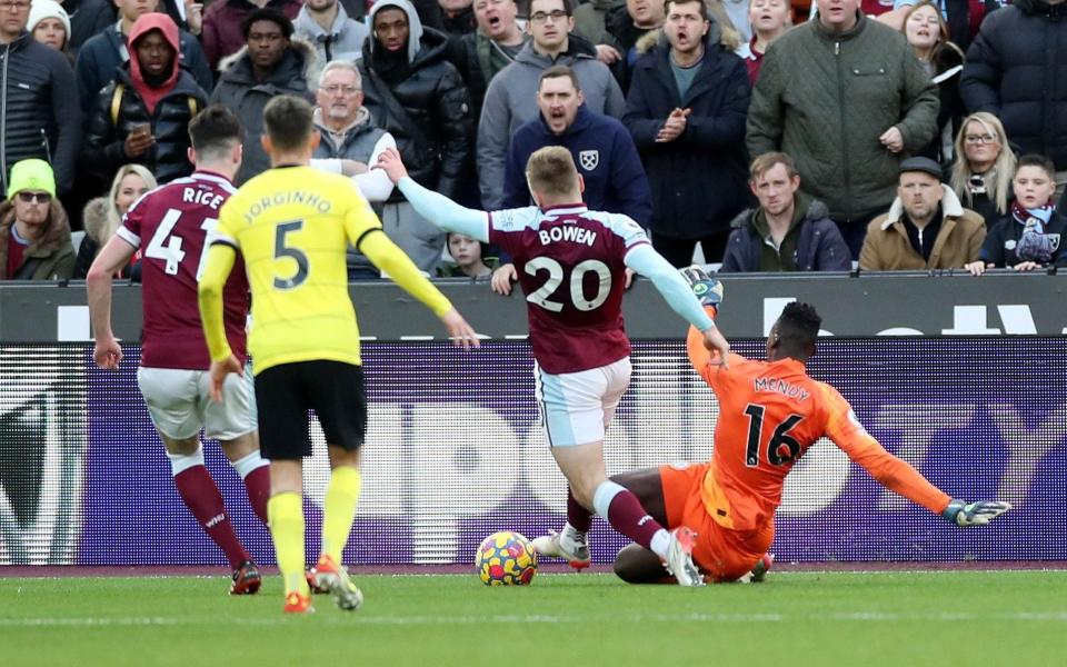 West Ham United's Jarrod Bowen is fouled by Chelsea's Edouard Mendy and wins a penalty - Action Images via Reuters/Peter Cziborra 