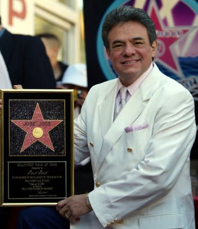 FILE PHOTO: Mexican balladeer Jose Jose holds his plaque after receiving a star on the Hollywood Walk of Fame in Hollywood, California