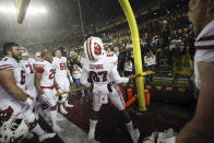 Wisconsin wide receiver Quintez Cephus (87) holds Paul Bunyan's Axe in celebration after Wisconsin beat Minnesota 38-17 in an NCAA college football game Saturday, Nov. 30, 2019, in Minneapolis. (AP Photo/Stacy Bengs)