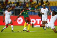 Football Soccer - African Cup of Nations - Burkina Faso v Cameroon - Stade de l'Amitie - Libreville, Gabon - 14/1/17. Cameroon's Jacques Zoua Daogari is tackled by Burkina Faso's Bakary Kone. REUTERS/Mike Hutchings