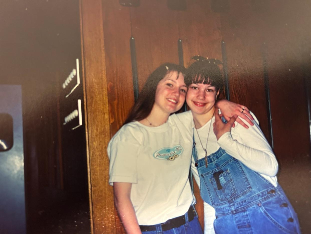 Jessica Cooper, left, is pictured with her sister Laura Jones when they were growing up.