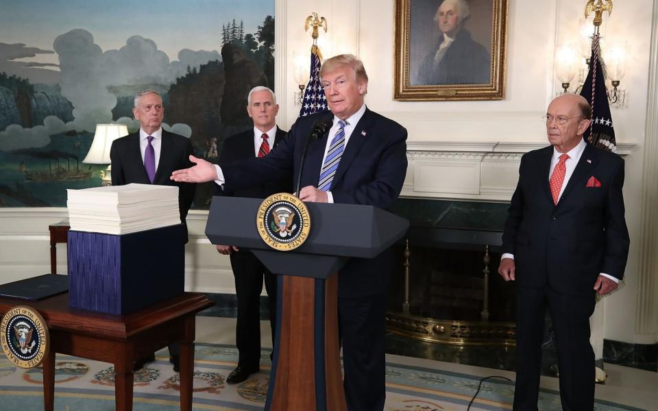 Donald Trump with the bill - Getty Images North America