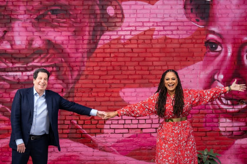 LOS ANGELES, CA - DECEMBER 19: Warner Bros. Television Chairman Peter Roth and filmmaker Ava DuVernay pose for a portrait at Array HQ on Saturday, Dec. 19, 2020 in Los Angeles, CA. (Kent Nishimura / Los Angeles Times)