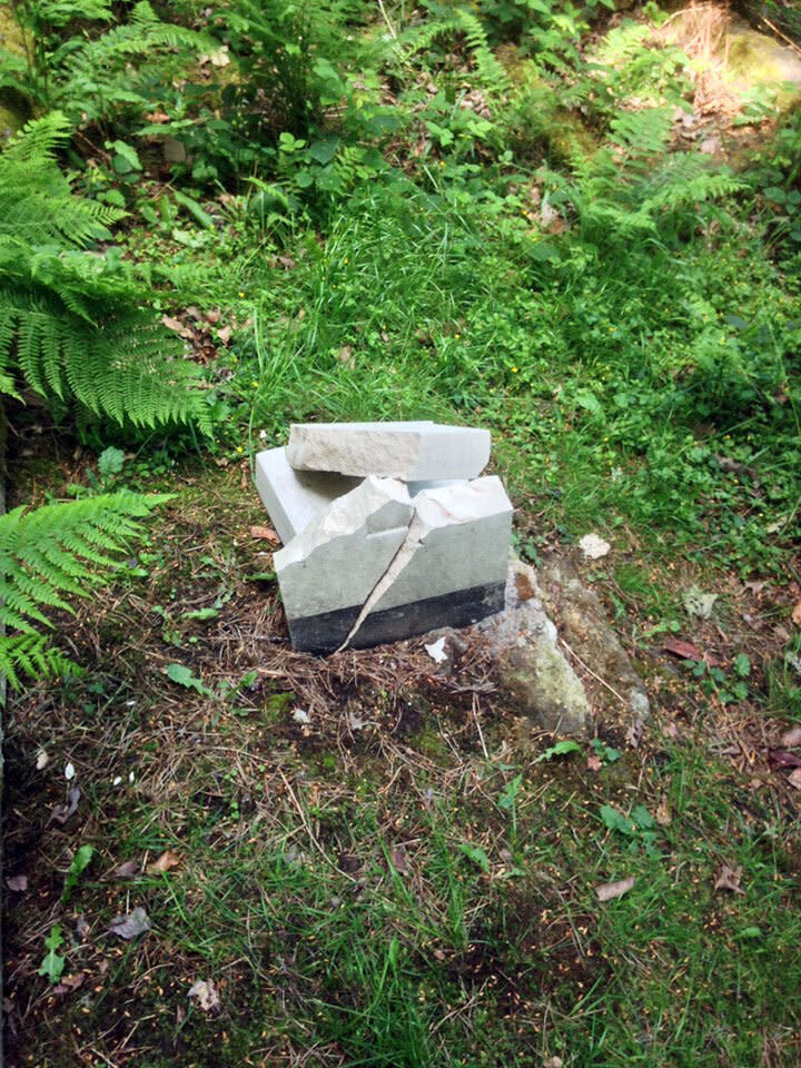 Another of the gravestones found smashed in the cemetery (PA)