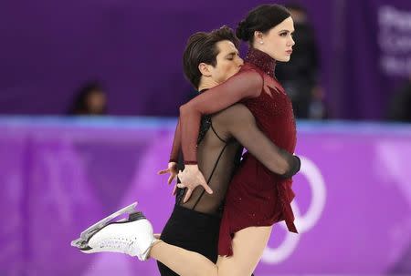 Figure Skating - Pyeongchang 2018 Winter Olympics - Ice Dance free dance competition final - Gangneung, South Korea - February 20, 2018 - Tessa Virtue and Scott Moir of Canada perform. REUTERS/Lucy Nicholson