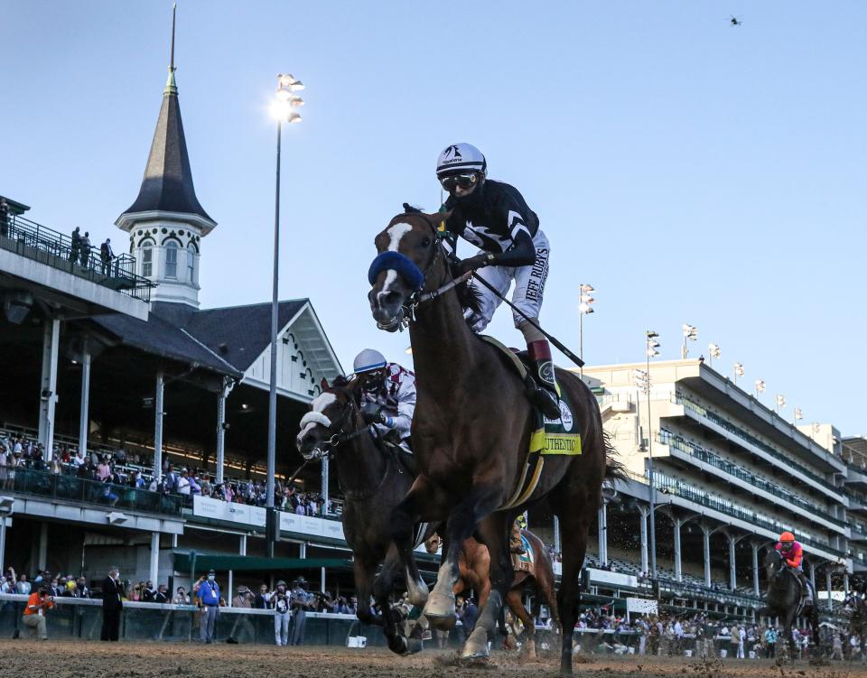 Jockey John Velazquez rides Authentic to the win at the 146th Kentucky Derby on Saturday.