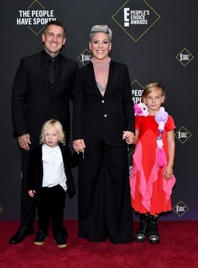 The singer, her husband and their cute kids were all smiles on the red carpet on Sunday.