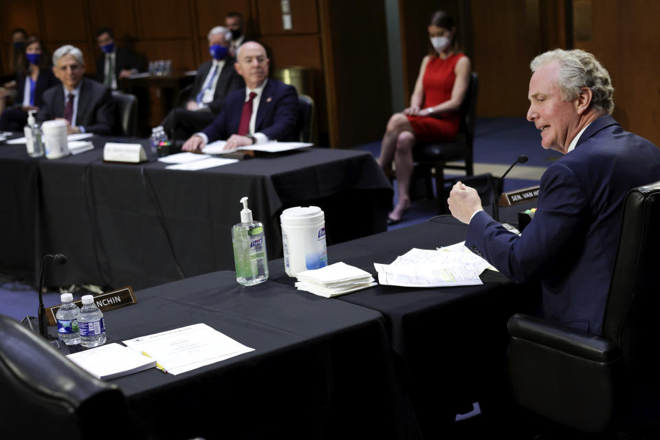 Sen. Chris Van Hollen, D-Md., as Attorney General Merrick Garland and Homeland Security Secretary Alejandro Mayorkas look on during a Senate Appropriations committee hearing to examine domestic extremism, Wednesday, May 12, 2021 on Capitol Hill in Washington. (Alex Wong/Pool via AP)