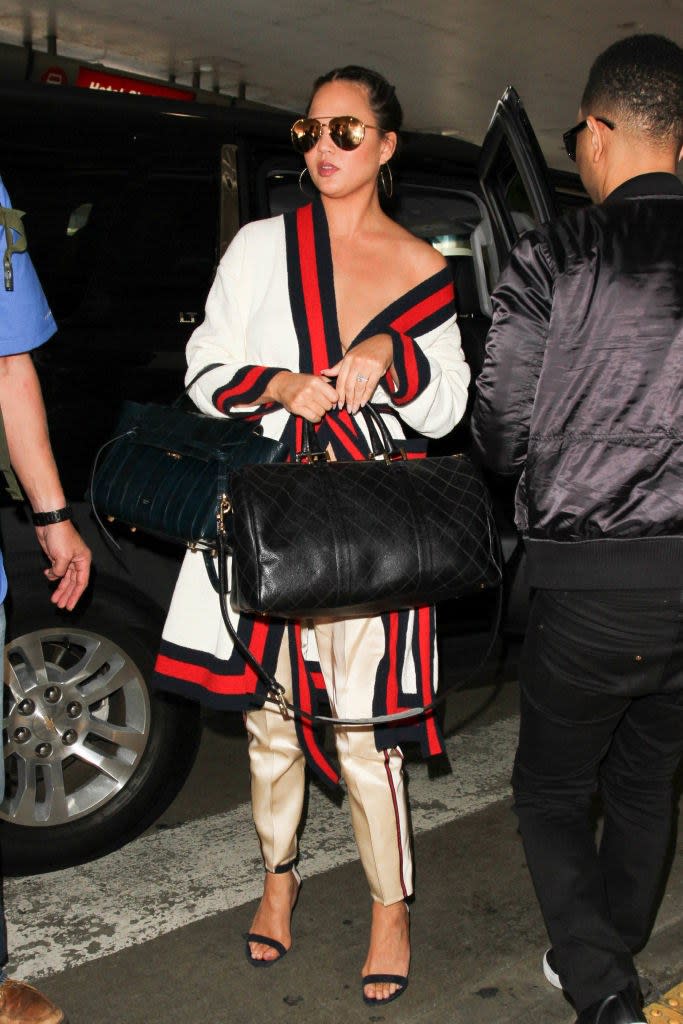 Chrissy Teigen's Off-the-Shoulder Cardigan