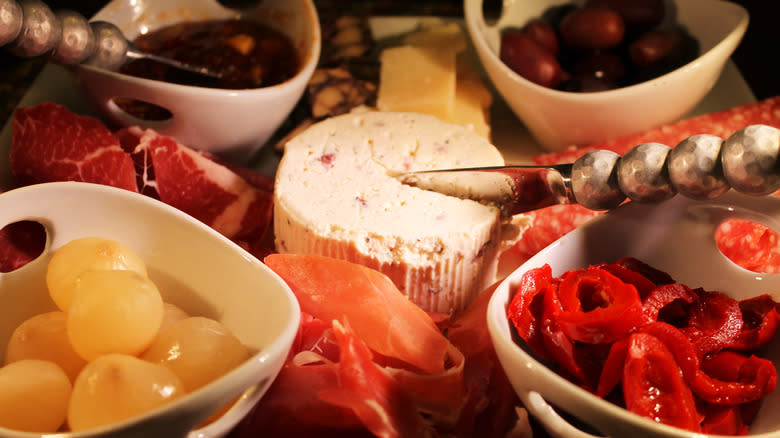 Charcuterie board with knives