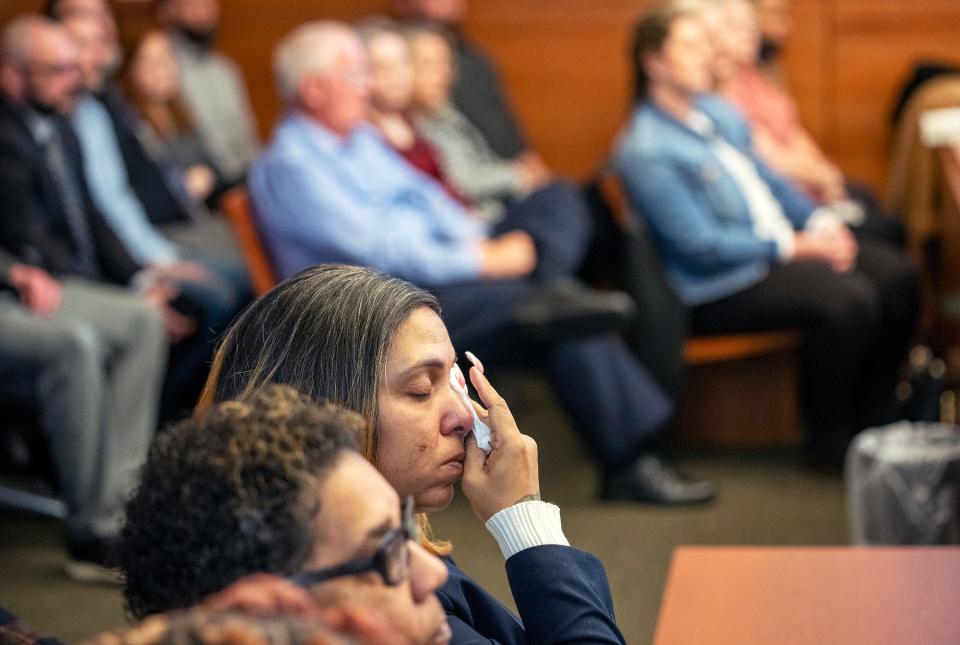 Jan 31, 2024; Columbus, Ohio, USA; Tamala Payne, mother of Casey Goodson, wipes tears form her eyes while watching the opening statement of Special Prosecutor Gary Shroyer in the trial of Former Franklin County Sheriff's deputy Michael Jason Meade at the Franklin County Common Pleas Court. Meade, 45, is charged with murder and reckless homicide in the Dec. 4, 2020, death of Casey Goodson Jr.