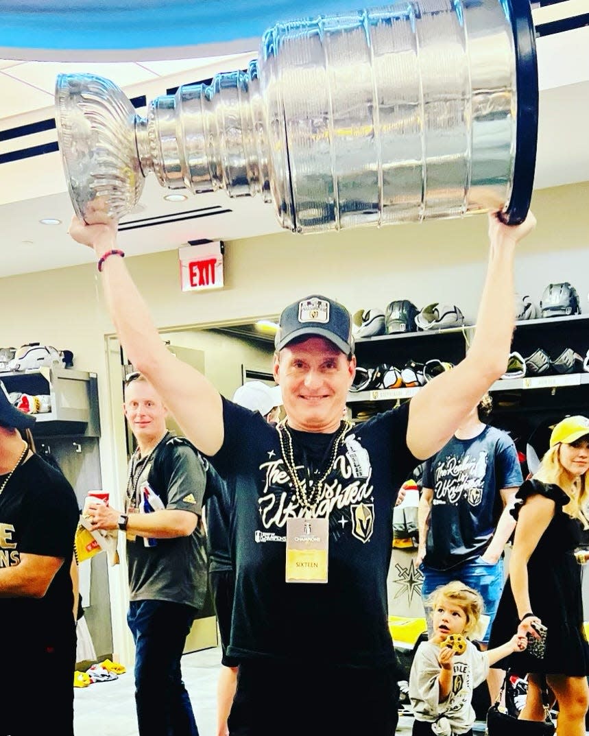 Dave Goucher joined the Vegas Golden Knights in the locker room to hoist the Stanley Cup after last season's championship victory.
