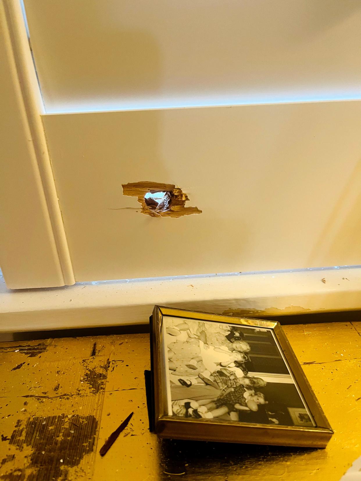 Damage from a stray bullet at the Gordonston home of George McGarvey and Bruce Miller