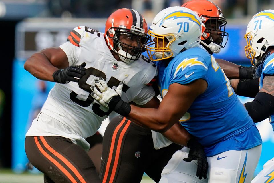 Los Angeles Chargers offensive tackle Rashawn Slater (70) blocks on Cleveland Browns defensive end Myles Garrett (95) during the second half of an NFL football game Sunday, Oct. 10, 2021, in Inglewood, Calif. (AP Photo/Gregory Bull)