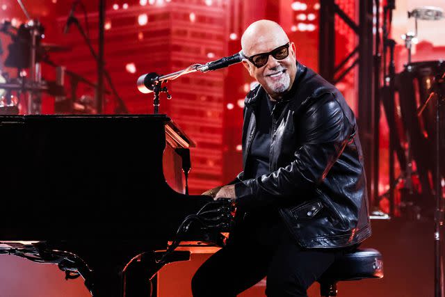 <p>John Shearer/Getty </p> Billy Joel performing at the 66th Grammy Awards in Los Angeles in February 2024