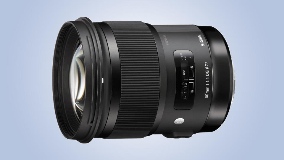 Sigma 50mm f/1.4 DG HSM Art lens on blue background