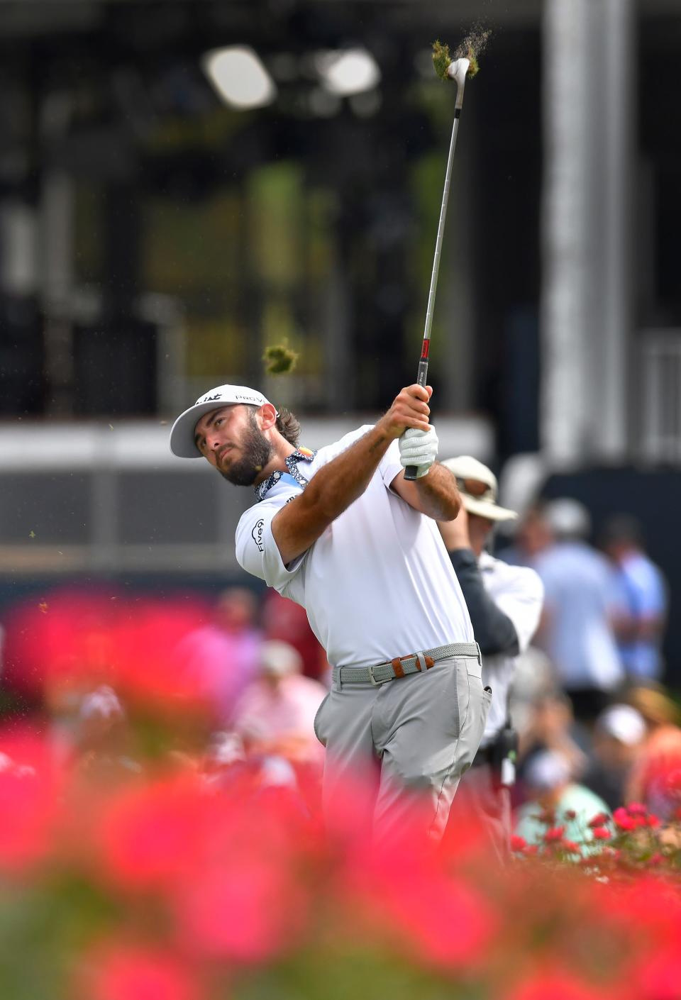 Max Homa tries his second shot to the island hole 17 after putting his first shot in the water during final round action of The Players Championship.